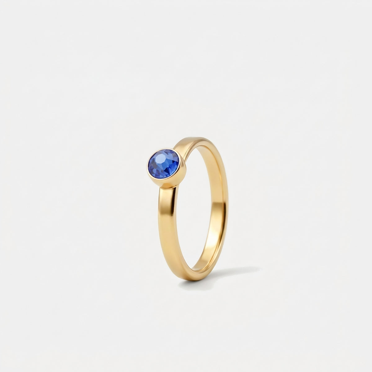 September Saffier Ring verguld
