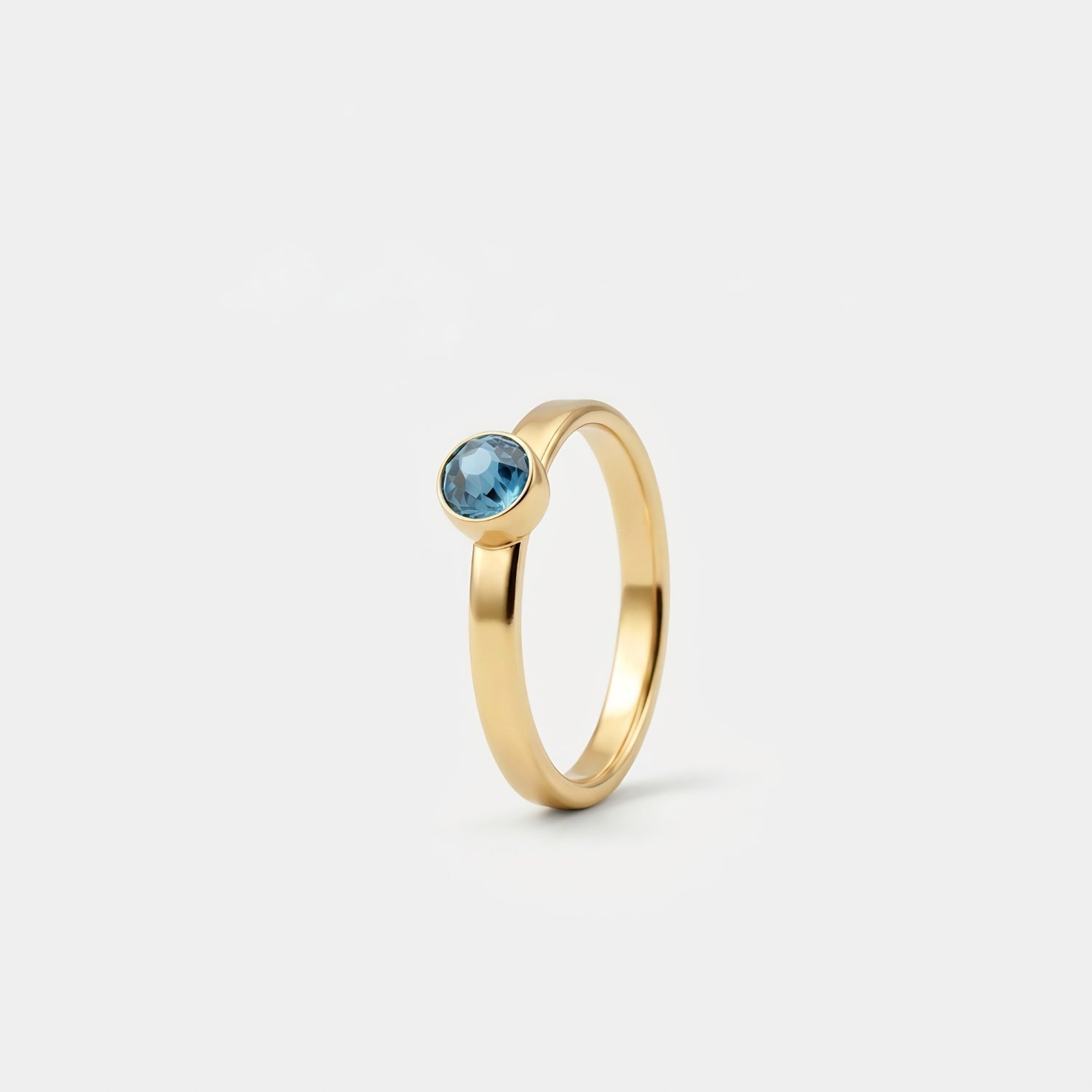 December Blauwe Topaas Ring verguld